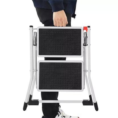 In And OutdoorMatch Opklapbare opstap Jurgen - met 2 treden - Trapladder - Ladder - 20 cm brede trede - Antislip - Rubberen mat - Met draagbeugel - Belastbaar tot 150 kg - Gemaakt van staal - Gecertificeerd door TV GS - Wit/Zwart Ladder